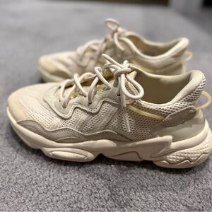 Adidas Ozweego shoes in a cream color way
